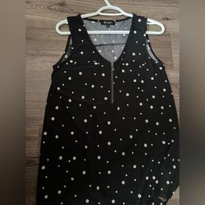 Elegant Black and White Polka Dot Sleeveless Blouse
